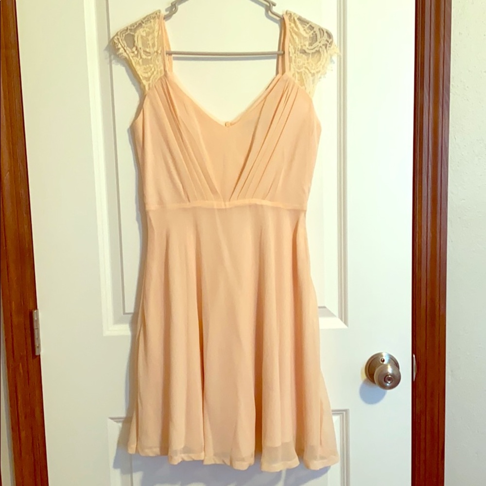 Boohoo brand blush and cream cocktail dress